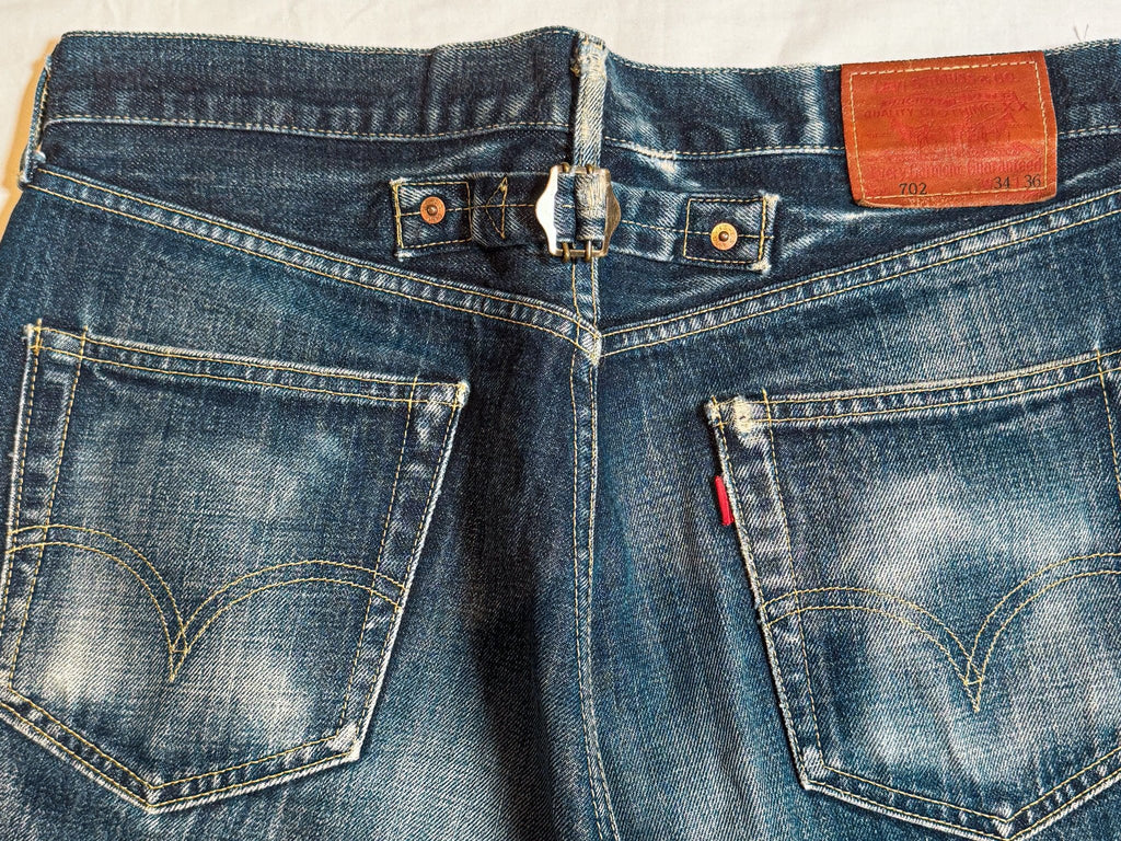 1990s Made in Japan Levi’s 702XX Cinchback Big E Selvedge Denim Jeans - 34x33 (Tagged 34x36)