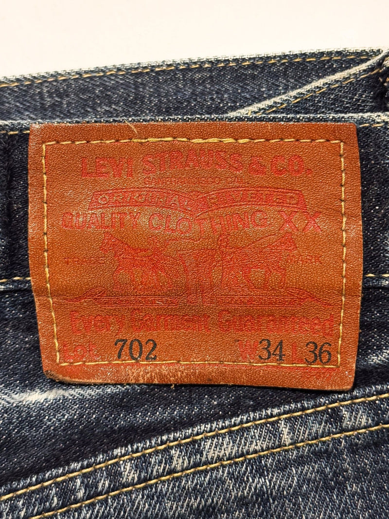 1990s Made in Japan Levi’s 702XX Cinchback Big E Selvedge Denim Jeans - 34x33 (Tagged 34x36) - Lazy Sun